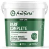 A white plastic tub of AniForte Barf Complete dog food supplement, with green labeling and graphics. Produktbild-Vorschau