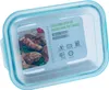 A glass oven dish with a blue lid, showing a picture of food inside and product information on the lid. Náhled obrázku produktu