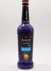 A bottle of blue curacao syrup on a white background. Produktbild-Vorschau