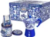 A coffee maker set with a box, coffee bags, and a lid, all decorated with a blue and white pattern. Náhľad obrázku produktu