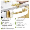A person's hand is shown peeling potatoes over a white kitchen waste collecting tray that is attached to a kitchen drawer. Náhled obrázku produktu