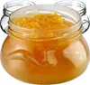 Three glass jars filled with orange jam, with the front jar in focus. Náhľad obrázku produktu