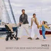 A family is walking along a pier with boats in the background. The father is pushing a stroller with a baby in it, while the mother holds their daughter's hand. Voir les images du produit