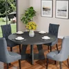 A dining table set with chairs, flowers, and place settings, set in a room with a window view of a garden. Anteprima dell’immagine prodotto