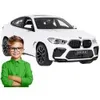 A child stands in front of a white remote-controlled car. Podgląd zdjęcia produktu