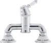 A chrome and white faucet with decorative elements on a white background. Produktbild-Vorschau