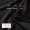A black fleece blanket with icons and text indicating its versatility for picnics, camping, and home use, along with an OEKO-TEX certification logo. Produktbild-Vorschau
