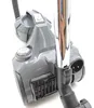 A close-up view of a gray cylinder vacuum cleaner with a chrome extension wand. Anteprima dell’immagine prodotto