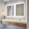 A modern bathroom vanity with a double sink and illuminated mirrors. Podgląd zdjęcia produktu