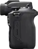 Side view of a black digital camera. Voir les images du produit