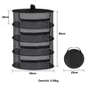 A black drying net with multiple shelves and zippers, shown next to its folded form. Dimensions and weight are indicated. Produktbild-Vorschau