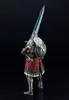 A full-body shot of an action figure of a warrior holding a sword and shield, against a black background. Produktbild-Vorschau