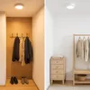 A split image showing two different hallway/entryway setups with clothing and furniture. Náhľad obrázku produktu