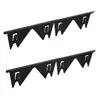 Two black metal stove gap covers are shown against a white background. Anteprima dell’immagine prodotto