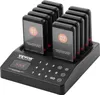 A black restaurant pager system with multiple pagers docked in a charging base, shown on a white background. Voir les images du produit