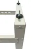 Close-up of a beige metal bracket with black rubber feet and bolts, likely part of an air conditioning unit stand. Náhľad obrázku produktu