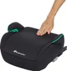 A hand is pressing down on a black car seat booster with green accents. Produktbild-Vorschau