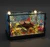 A LEGO-style aquarium with a turtle, fish, and coral, illuminated by small lights. Náhľad obrázku produktu
