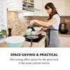 A woman is cooking in a modern kitchen, and text overlays describe a "space-saving & practical" feature related to spice racks. Náhľad obrázku produktu