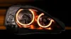Rückansicht von Für Opel Corsa C ab 2000-2006 Angel Eyes Scheinwerfer Schwarz LINKS + RECHTS mit Fokus auf Befestigungselemente Produktbild-Vorschau