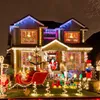 A house decorated with numerous Christmas lights and figures for the holidays. Náhled obrázku produktu