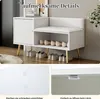 A white shoe cabinet with a cushioned seat and storage shelves, displayed in a room setting with shoes on the shelves. Two inset images show details of the cabinet's construction. Produktbild-Vorschau