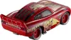 A close-up rear view of a red toy car, Lightning McQueen from Disney Pixar's Cars franchise. Produktbild-Vorschau