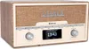 A retro-style stereo system with a wooden casing, fabric speaker grille, and a digital display. Náhľad obrázku produktu