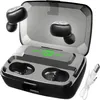 A pair of black wireless earbuds with a charging case and a USB cable. Náhľad obrázku produktu
