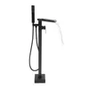A black freestanding bathtub faucet with a handheld showerhead and a waterfall spout is shown against a white background. Water is flowing from the waterfall spout. Podgląd zdjęcia produktu