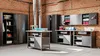A storage and workshop space with metal cabinets and workbenches. Náhľad obrázku produktu
