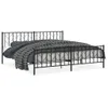 A black metal bed frame with a mattress and bedding. Podgląd zdjęcia produktu