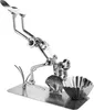 A metal sculpture of a diver with a shell and a fluted cup. Podgląd zdjęcia produktu