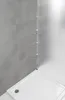 A corner shower caddy with four shelves is shown in a modern bathroom setting, next to a shower tray. Produktbild-Vorschau