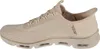 Side view of a beige Skechers slip-on shoe. Produktbild-Vorschau