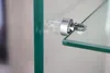 A close-up view of a glass shelf supported by a metal bracket. Produktbild-Vorschau