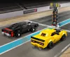 Two LEGO cars on a race track with a starting light. Náhled obrázku produktu