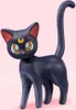 A black cat figurine with a crescent moon on its forehead. Produktbild-Vorschau