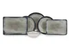 A set of dark blue and gray ceramic plates and a bowl arranged on a white background. Produktbild-Vorschau