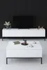 A modern living room setup with a TV stand and a coffee table. Produktbild-Vorschau