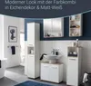 A modern bathroom with white and oak furniture, including a tall cabinet, a vanity with a sink, and a smaller cabinet. Produktbild-Vorschau