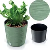 A green plant pot with a plant inside, next to a black inner pot and a circular swatch of the pot's texture. Produktbild-Vorschau