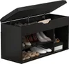 A black shoe cabinet with its lid open, revealing shoes stored inside. Produktbild-Vorschau