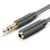 A close-up shot of a Ugreen audio cable with a 3.5mm male connector and a 3.5mm female connector. Produktbild-Vorschau