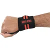 A person's wrist wearing a black wristband with red stripes and the text 'GORILLA SPORTS'. Náhľad obrázku produktu
