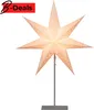 A lit paper star lantern on a stand against a white background. Produktbild-Vorschau