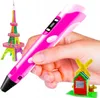 A hand holding a pink 3D pen, with a colorful Eiffel Tower model and a small windmill model in the background. Náhľad obrázku produktu