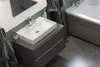 A modern bathroom with a sink and bathtub. Podgląd zdjęcia produktu