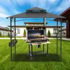 A grill gazebo with a rotisserie grill set up in a backyard with a house in the background. Voir les images du produit