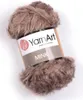 A ball of fluffy brown yarn with a label. Produktbild-Vorschau
